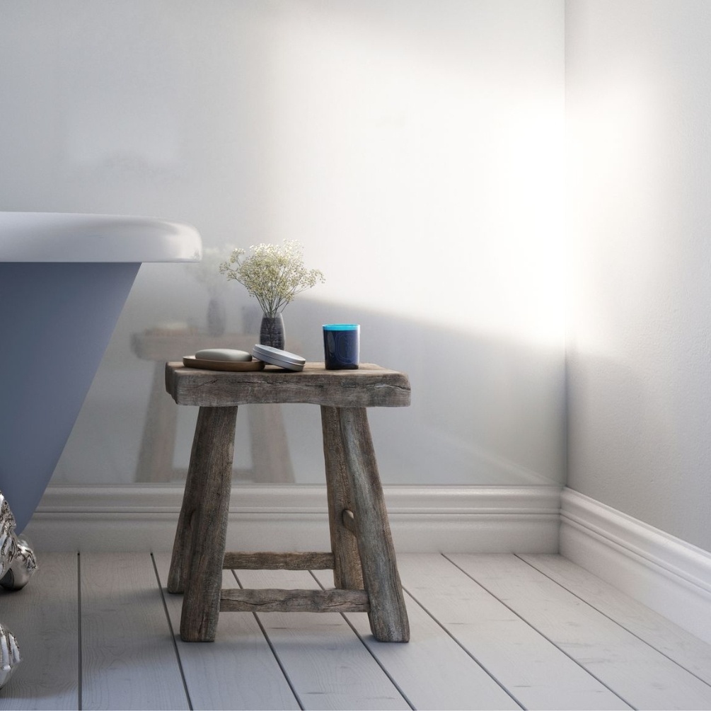 Lifestyle image of the Showerwall Laminate Pearlescent White 2440mm x 1200mm Square Cut MDF Wall Panel installed near a freestanding bath - SW31